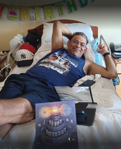Resident celebrating birthday in their room