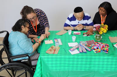 Residents engaged in an arts and crafts activity