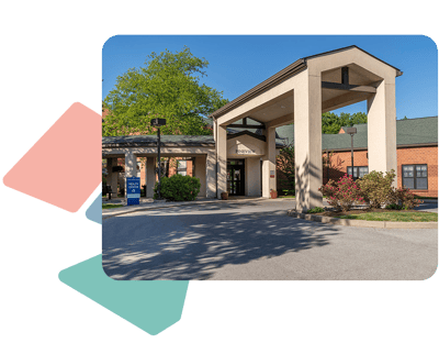 Entrance of Lutheran Village at Wolf Creek with green landscaping