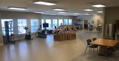 Interior view of a fitness area with exercise equipment