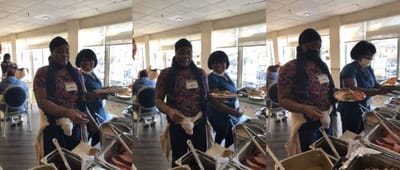 Staff serving food in the dining area