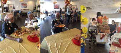 Residents enjoying a Thanksgiving celebration with food and decorations