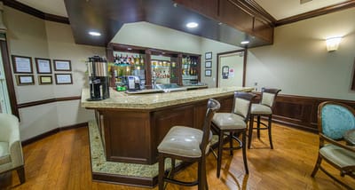 Interior view of the facility bar area with seating