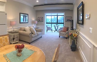 A cozy interior living space of a resident unit