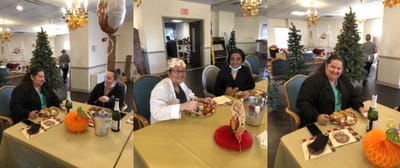Residents enjoying a meal together in the dining area