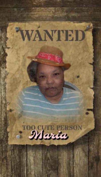 A decorative 'wanted' poster with a smiling woman
