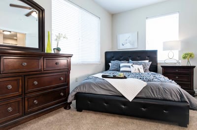 Cozy resident room with a bed and furniture