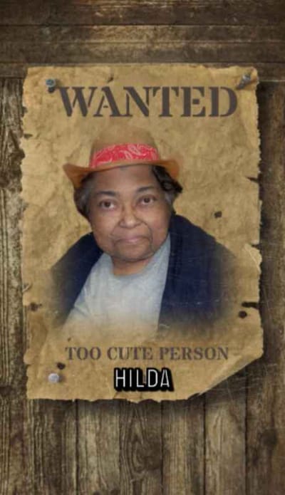 A humorous 'Wanted' poster featuring a resident named Hilda