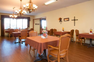 Dining area with tables and chairs set up