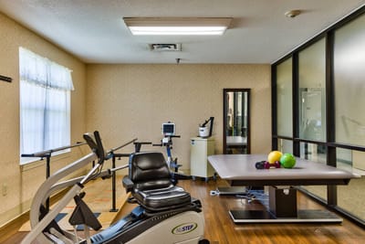 Rehabilitation therapy room with exercise equipment