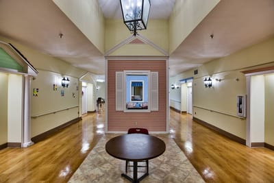 Interior view of a hallway with a seating area
