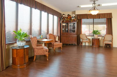 Bright common area with seating and plants