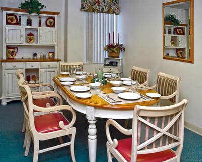 Dining room set for a meal in a cozy dining area
