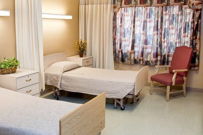 Interior view of a twin bedroom in a facility