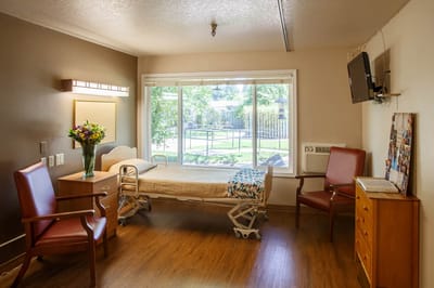 Cozy and well-lit resident room with a view
