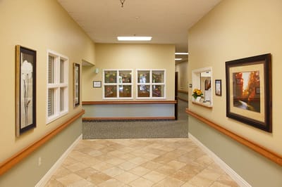 Hallway interior with artwork and seating