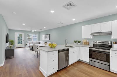 Bright and modern kitchen and living area in a senior facility