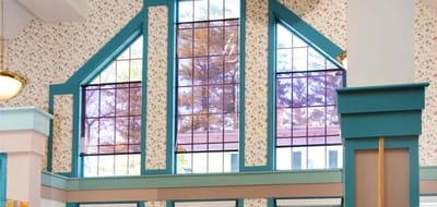 Bright interior of a common area with large windows