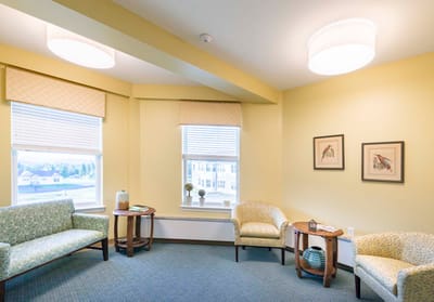 Bright common area with seating and decor