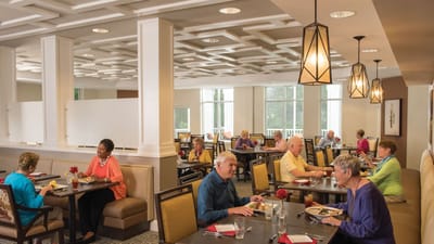 Residents enjoying meals in the dining room