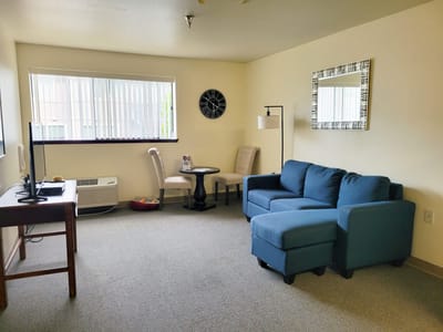Cozy interior living space with couch and table