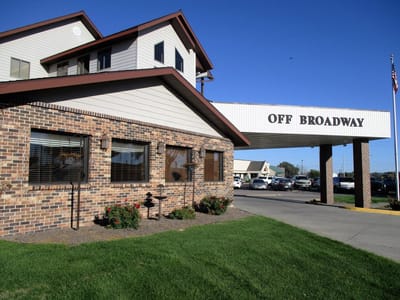 The building exterior of Off Broadway Apartments
