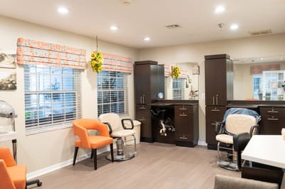 Interior view of a salon area with styling chairs