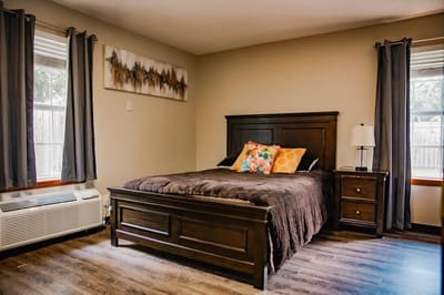 Cozy private room with a bed and decor