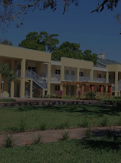 Exterior view of the assisted living facility with landscaping