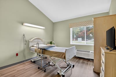 Well-furnished resident room in a senior living facility