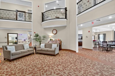 Bright common area with seating and decor