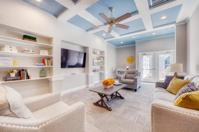 Bright common area with comfortable seating and decor