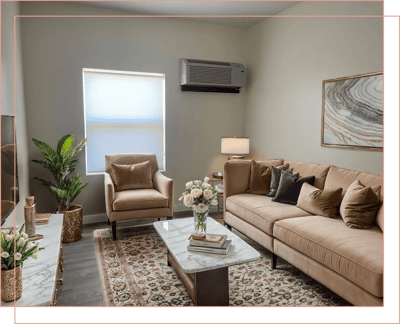 Comfortable lounge area with seating and artwork
