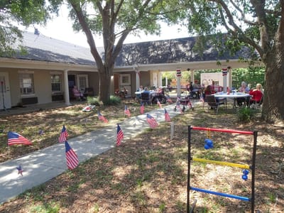 Residents enjoying an outdoor activity with decorations