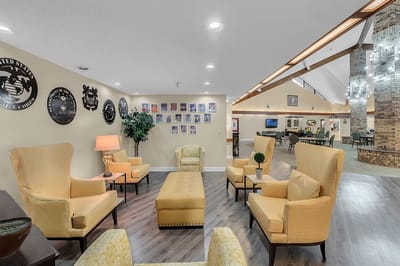 Common area with seating and decorative walls