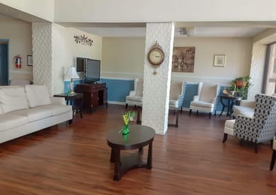 Bright common area with seating and decor