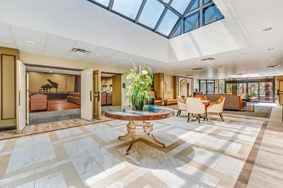 Bright common area with seating and decor