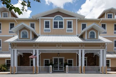 Exterior view of Grand Oaks facility with architectural features