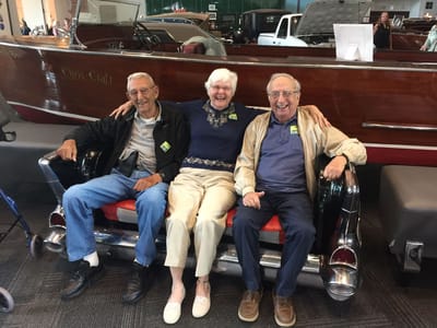 Three residents sitting together in a common area