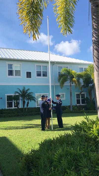 Flag ceremony in the outdoor space of the facility