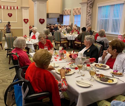 Residents enjoying dinner during a celebration event