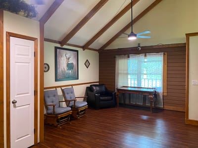 Bright common area with seating and artwork