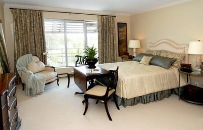 Elegant bedroom with furniture and natural light