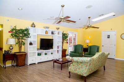 Bright common area with seating and decor