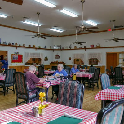 Residents enjoying a meal in the dining room