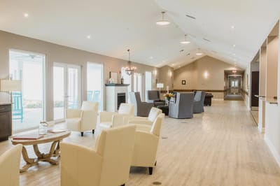 Bright common area with seating and natural light
