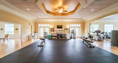Well-equipped fitness room with exercise equipment