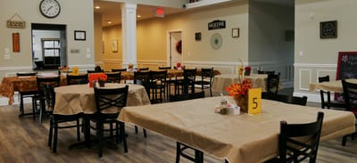 Interior dining area with tables and decorations