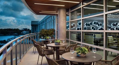 Outdoor dining area with view of the bay