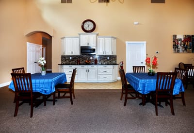 Bright dining room with tables and chairs
